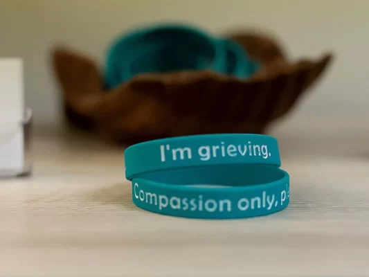 cfc our story grieving bands table